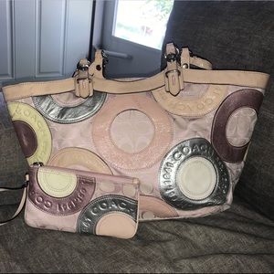 Pink leather Coach purse.